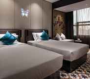 Bedroom 6 Paco Song Hotel (Guangzhou Finan