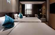 Bedroom 3 Paco Song Hotel (Guangzhou Finan