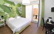 Bedroom 2 Logis Hotel De La Baie