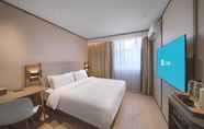 Bedroom 4 Hanting Hotel Nanjing Jiangpu Longhua Road Metro S