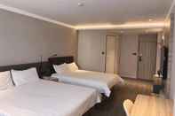 Kamar Tidur Hanting Hotel Longkou Zhenhua Mall