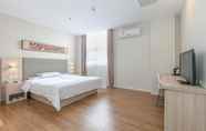 Kamar Tidur 2 Hanting Hotel Wuhan Fuxing Road Metro Station Bran