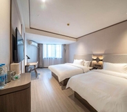 Bedroom 2 Hanting Hotel Shanghai Jiaoda Jiangchuan Road Metr