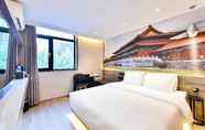 Kamar Tidur 5 Hanting Premium Hotel Sanyuanqiao Yansha Embassy