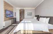 Kamar Tidur 4 Hanting Premium Hotel  Guangrao Four Seasons Flowe