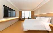 Kamar Tidur 6 Ji Hotel (Yiwu International Trade City)