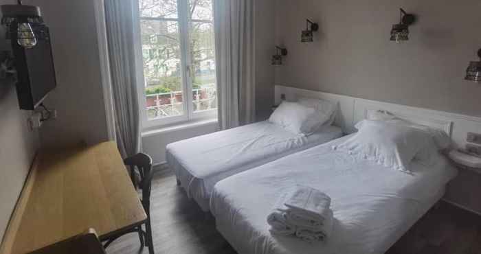 ห้องนอน Logis Hotel Le Relais Guillaume De Normandy