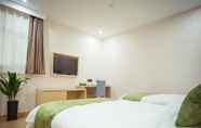 Bedroom 2 GreenTree Inn Nantong Development Zone Country Gar