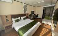 Kamar Tidur 4 Green Tree Inn Beijing Chaoyang District Dougezhua