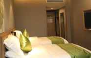 ห้องนอน 6 Greentree Inn Yueyang Miluo City Quyuan Avenue Exp