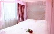 Kamar Tidur 2 Shell Ganzhou Central Theme Hotel