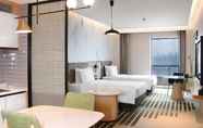 Bedroom 6 Holiday Inn Hotel & Sts Wuhan International Expo