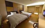 Kamar Tidur 6 Ji Hotel (Shanghai Jindu Road Branch)