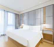 Bilik Tidur 2 Ji Hotel (Beijing Daxing Lvdi Binfencheng)