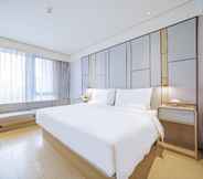 Bilik Tidur 6 Ji Hotel (Beijing Daxing Lvdi Binfencheng)