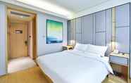 Kamar Tidur 7 Ji Hotel (Tangshan Wanda Plaza)