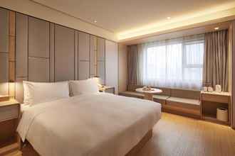 Kamar Tidur 4 Ji Hotel (Hanzhong Central Plaza)