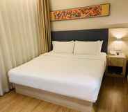 Bedroom 4 Hanting Hotel (shanghai Baogang Yueluo Road)