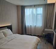 Bedroom 2 Hanting Hotel (Beijing Shijingshan Wanda Luda Stre