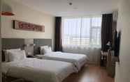 Bedroom 4 Hanting Hotel (Shuzhou East Minfu Street)