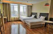 Bedroom 4 Hanting Hotel (Qingdao Develop. Zone Dongjiakou Po