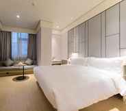 Kamar Tidur 7 Ji Hotel (Yuyao Yintaicheng)