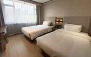 Bedroom 2 Hanting Hotel People's Street Jinzhou Railway Sta