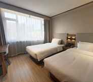 Bedroom 2 Hanting Hotel People's Street Jinzhou Railway Sta