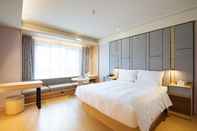 Kamar Tidur Ji Hotel Harbin Songbei Sunac Paradise