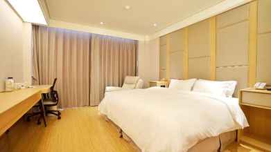 Bilik Tidur 4 Ji Hotel (Yantai Binhai Square)