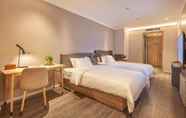 Bilik Tidur 3 Hanting Youjia Hotel (Qingdao Taidong Metro Statio