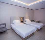 Bedroom 4 Hanting Hotel (Hangzhou Qiantang River Bridge)