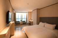 Bilik Tidur Hanting Hotel zhengdong area EXPO branch