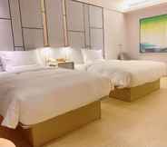 Kamar Tidur 2 Ji Hotel (Luoyang Longmen Railway Station)