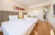 Bedroom 6 Hanting Hotel (Dalian Nanshidao Street)