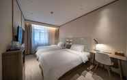 Bedroom 2 Hanting Hotel (Shanghai New International Expo Cen