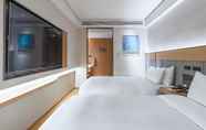 Bedroom 2 Ji Hotel (Shanghai Tangqiao Shimao Binjiang)