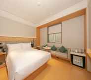 Bedroom 4 Ji Hotel(Beijing Wanda Taiwan Street store&Shijing