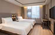 Bedroom 7 Hanting Hotel (Jiangnan global port )