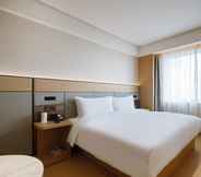 Kamar Tidur 6 Ji Hotel (Yantai Golden Beach )