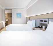 Kamar Tidur 7 Ji Hotel (Yantai Golden Beach )