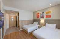 ห้องนอน Elan Hotel (Wuxi Taihu Rongxiang Railway station)