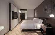 Kamar Tidur 4 Ni Hao Hotel (Wuhan Hankou Riverside)