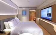 Kamar Tidur 6 Ji Hotel (World Expo San Lin Road)