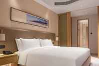 Kamar Tidur Primcasa Suites Hotel Financial City Chengdu