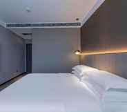 Bedroom 6 Teckon Myfeel Hotel Ningbo Tianyi Square East Gate
