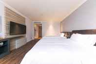 Kamar Tidur Hanting Express Xinchang Dafosi Hotel