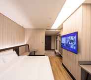 Bedroom 4 Hanting Hotel (Tianjin Baodi Xinduhui Commercial S