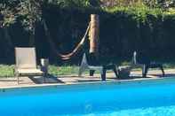 Swimming Pool Logis Hotel le Castel Fleuri