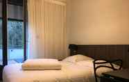 Phòng ngủ 3 Logis Hotel Au Floridor